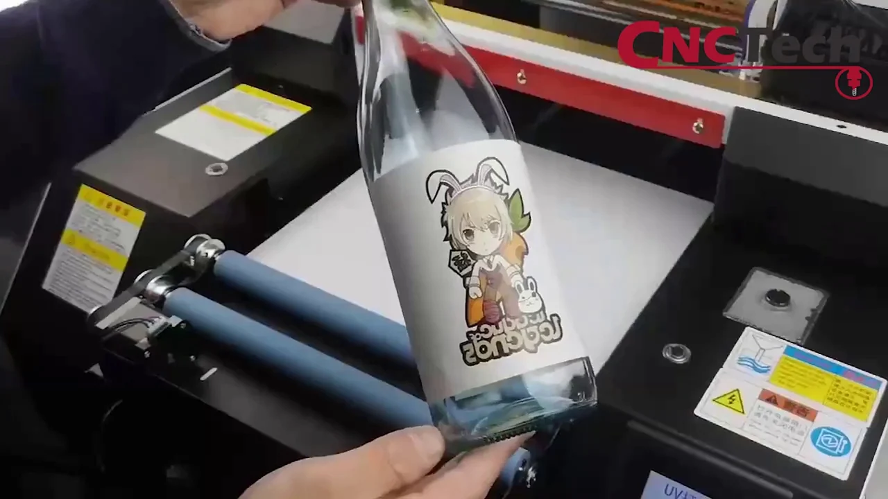 Direct UV-printen: fles in een rotatiehouder